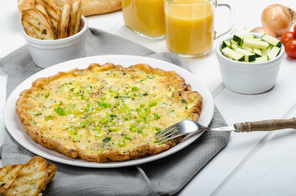 Recette omelette aux courgettes fromage et oignons verts